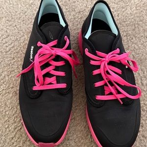 Black and pink Reebok